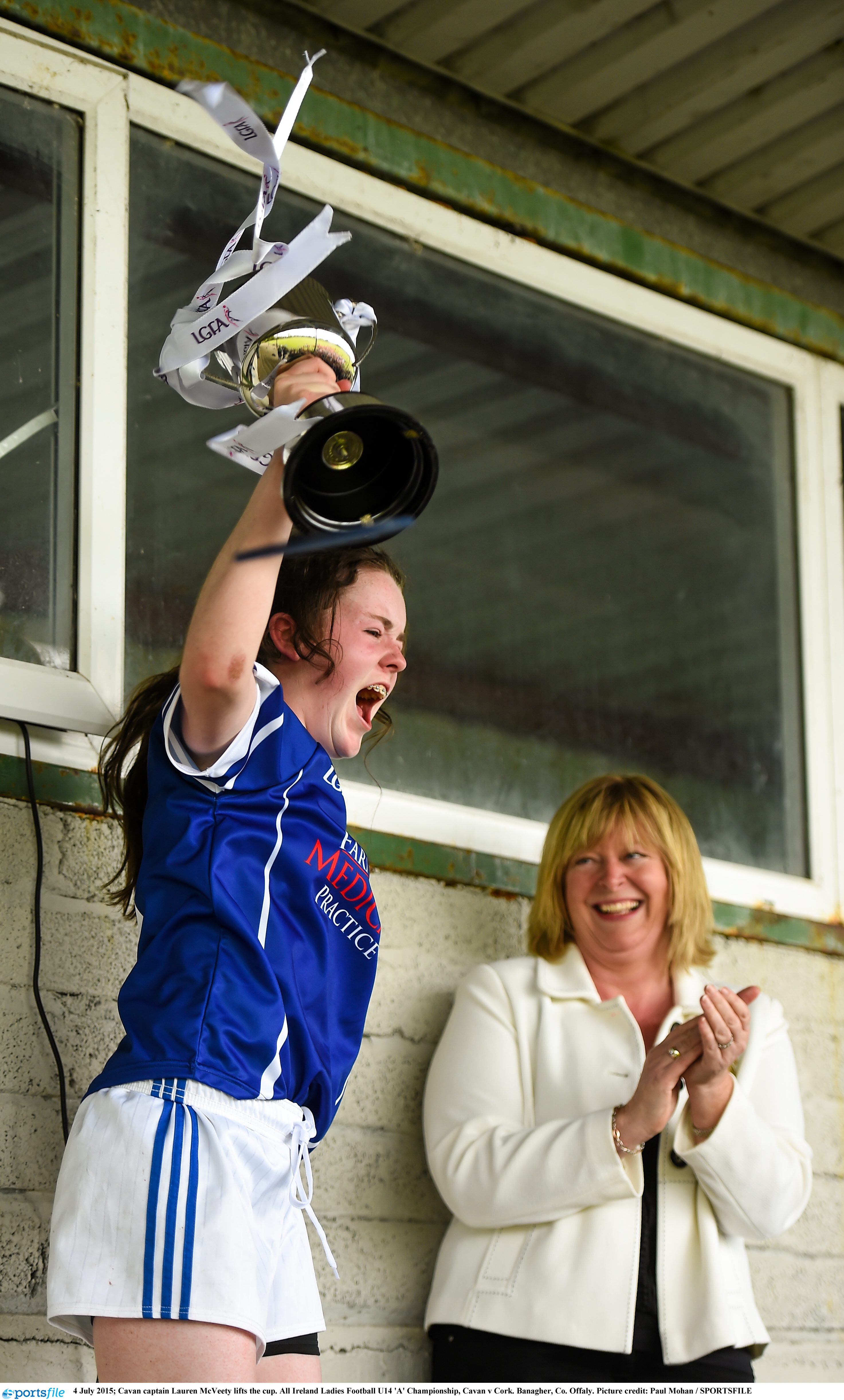 4 July 2015; Cavan captain Lauren McVeety lifts the cup. All Ireland Ladies Football U14 'A' Championship, Cavan v Cork. Banagher, Co. Offaly. Picture credit: Paul Mohan / SPORTSFILE