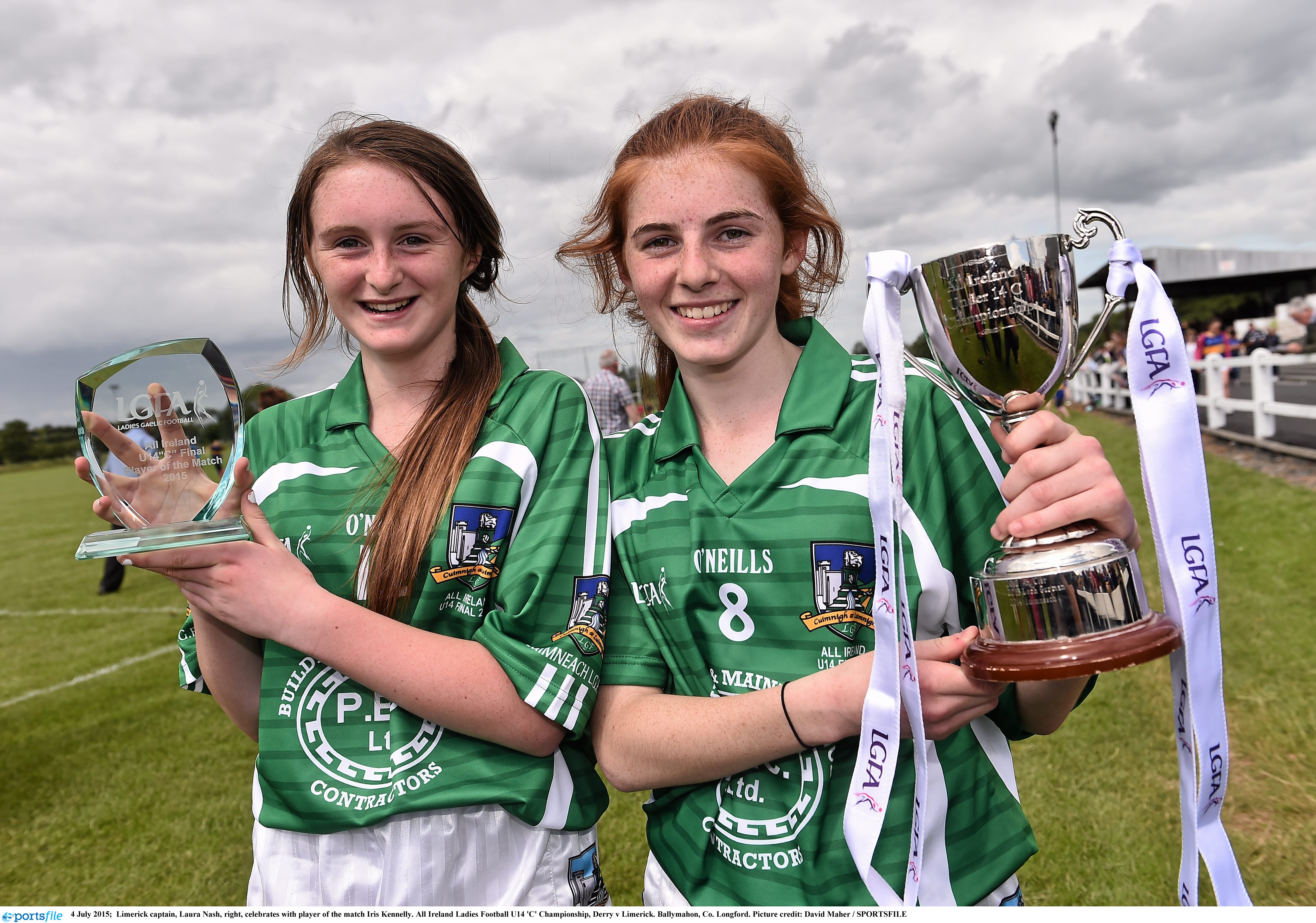 4 July 2015;  Limerick captain, Laura Nash, right, celebrates with player of the match Iris Kennelly. All Ireland Ladies Football U14 'C' Championship, Derry v Limerick. Ballymahon, Co. Longford. Picture credit: David Maher / SPORTSFILE