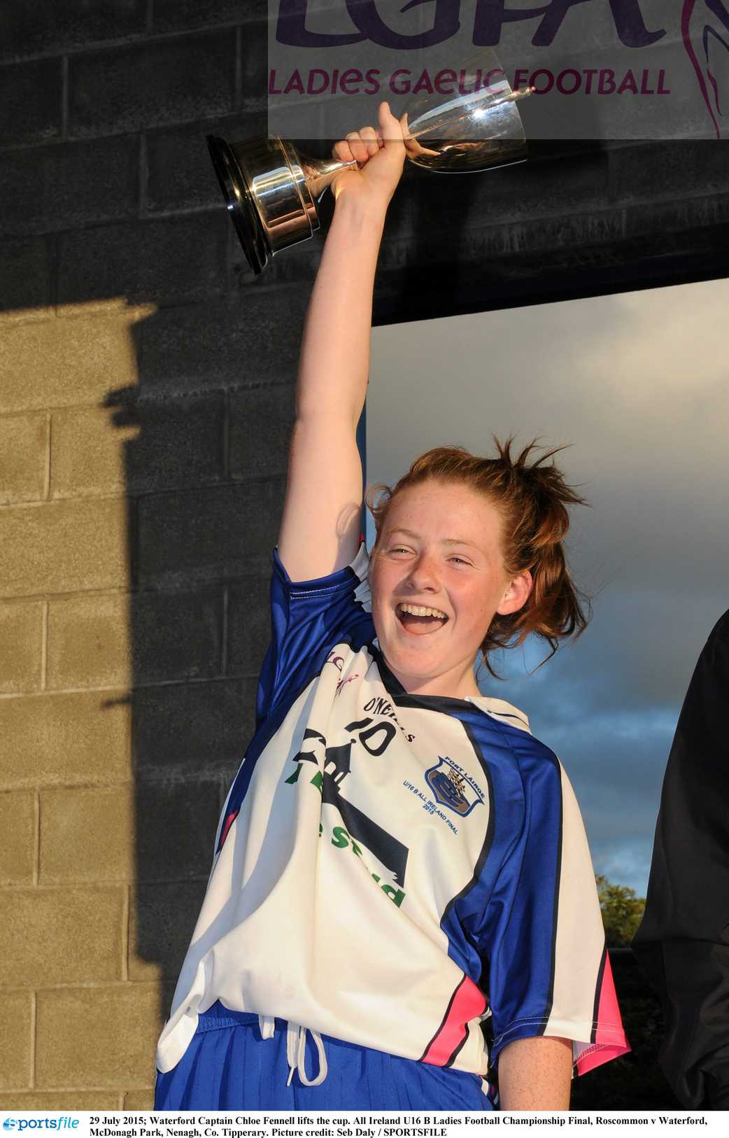 29 July 2015; Waterford Captain Chloe Fennell lifts the cup. All Ireland U16 B Ladies Football Championship Final, Roscommon v Waterford, McDonagh Park, Nenagh, Co. Tipperary. Picture credit: Seb Daly / SPORTSFILE