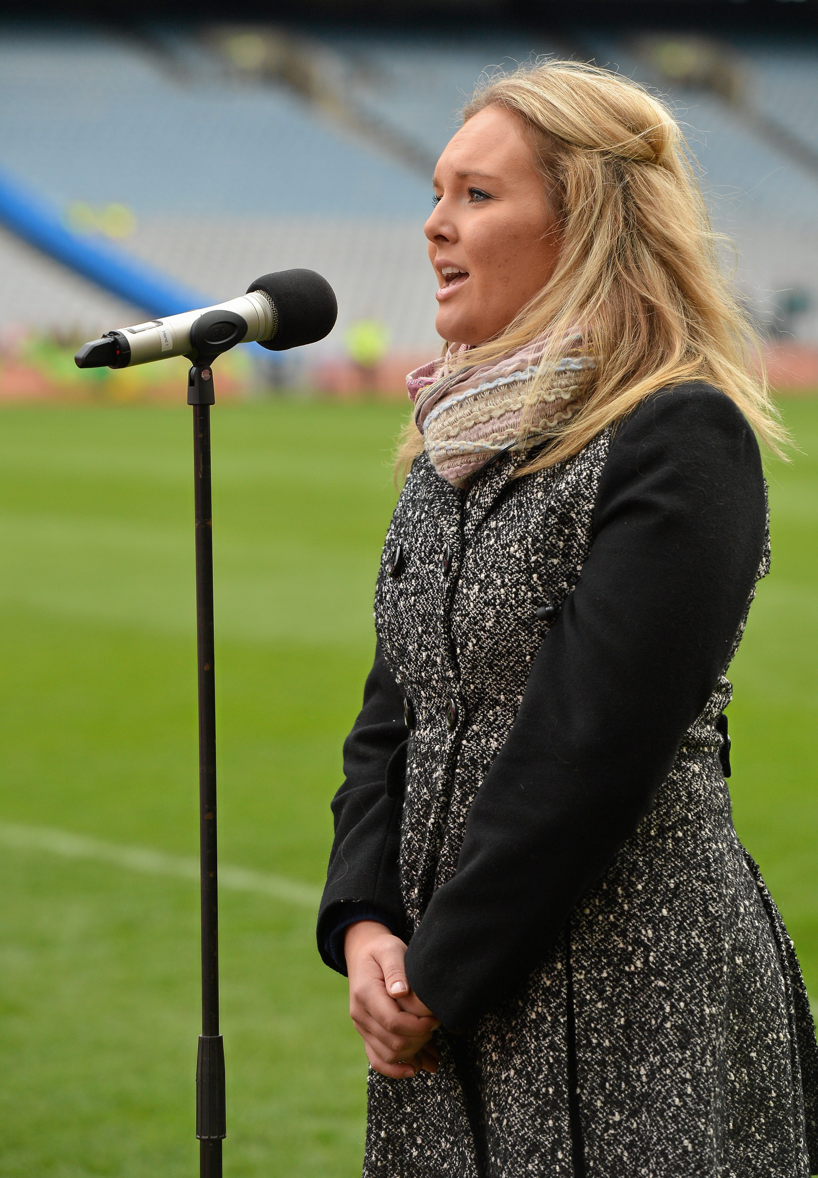 7 October 2012; Megan Burns sings Amhrán na bhFiann before the game. TG4 All-Ireland Ladies Football Senior Championship Final, Cork v Kerry, Croke Park, Dublin. Picture credit: Brendan Moran / SPORTSFILE *** NO REPRODUCTION FEE ***