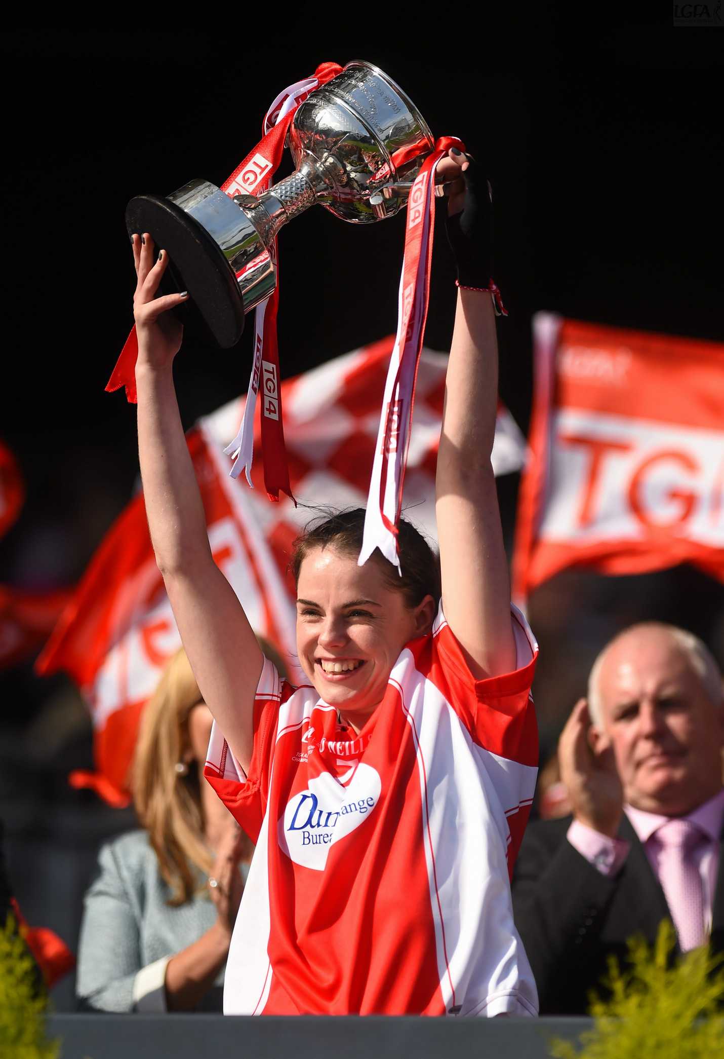27 September 2015; Louth captain Michelle McMahon lifts the West County Hotel cup. TG4 Ladies Football All-Ireland Junior Championship Final, Louth v Scotland, Croke Park, Dublin. Picture credit: Ramsey Cardy / SPORTSFILE *** NO REPRODUCTION FEE ***