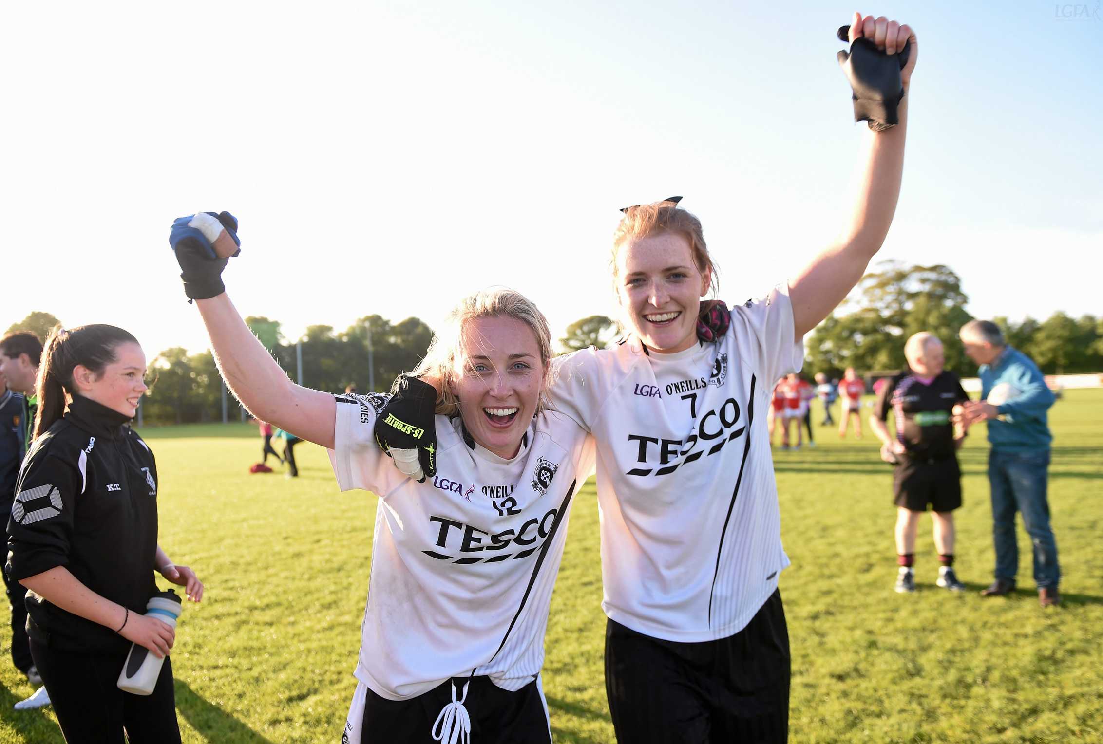 26 September 2015; Emyvale players Ciara McAnespie, left and Nicola Fahey celebrate after winning the All-Ireland Ladies Football Club Sevens Championship Final. Naomh Mearnog, Portmarnock, Co. Dublin. Picture credit: Paul Mohan / SPORTSFILE *** NO REPRODUCTION FEE ***