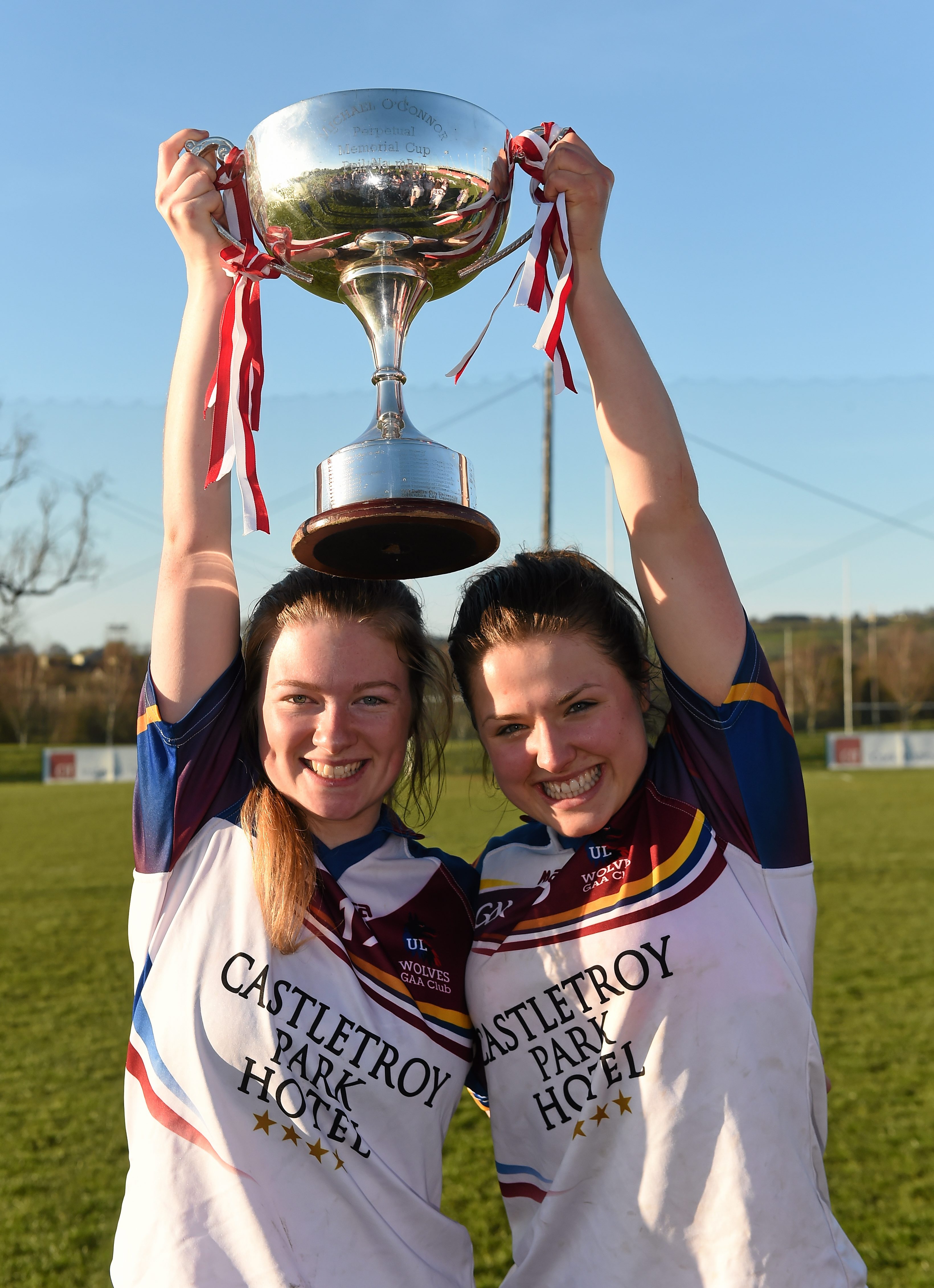 21 March 2015; UL players, Caroline McCarthy, left, and Claire O'Sullivan, both from Sneem/Kenmare, Co. Kerry, celebrate with the O'Connor cup after victory over DCU. O'Connor Cup Ladies Football Final, Dublin City University v University of Limerick, Cork IT, Bishopstown, Cork. Picture credit: Diarmuid Greene / SPORTSFILE *** NO REPRODUCTION FEE ***