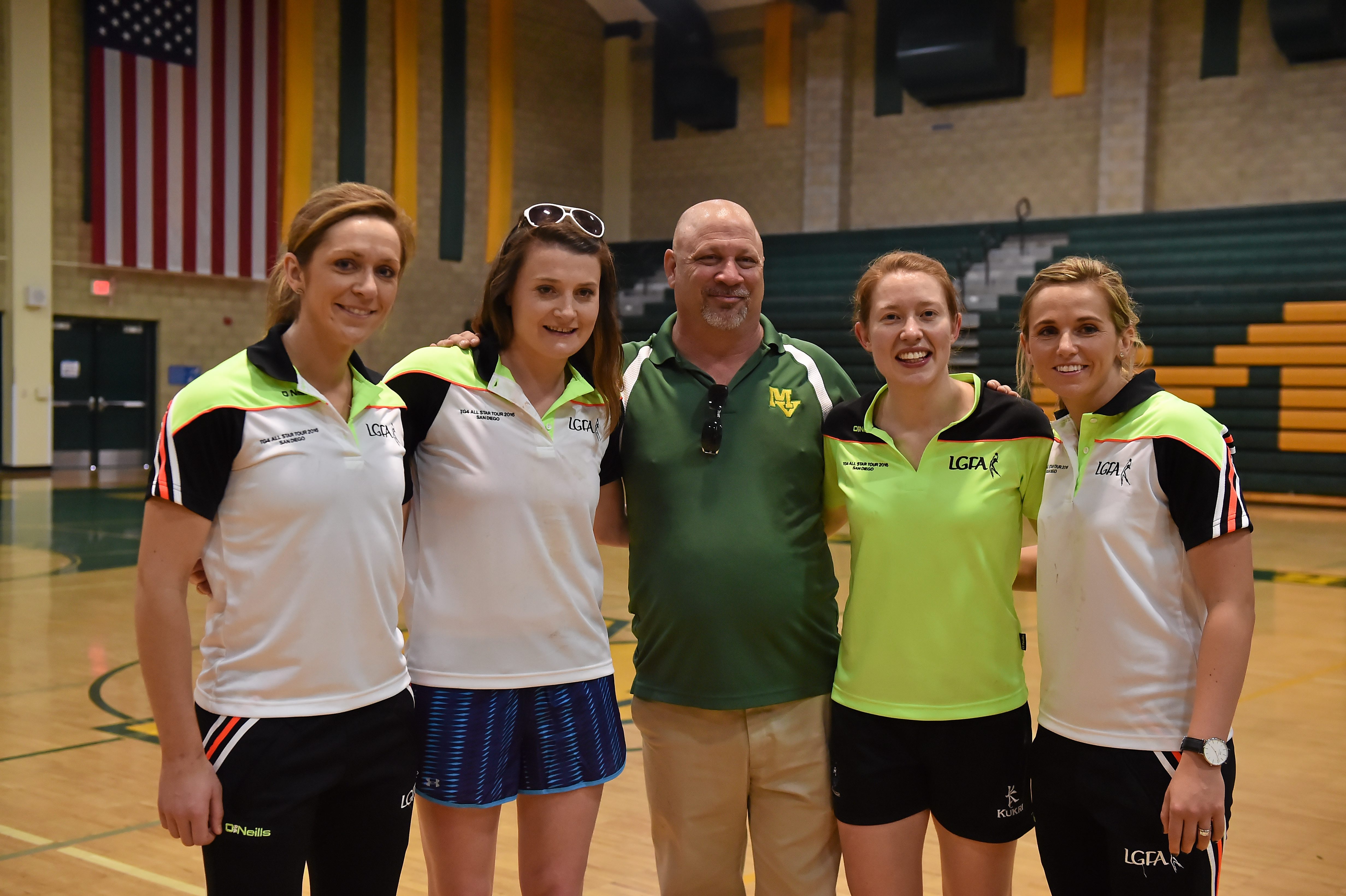 17 March 2016; TG4 LGFA All Stars Caroline O'Hanlon, Armagh, Sinead Kernan, Armagh, Annie Walsh, Cork, and Rena Buckley, Cork, after a demonstration of Ladies Football to students from Mar Vista High School. TG4 Ladies Football All-Star Tour, Mar Vista High School, Imperial Beach. California, USA. Picture credit: Brendan Moran / SPORTSFILE *** NO REPRODUCTION FEE ***