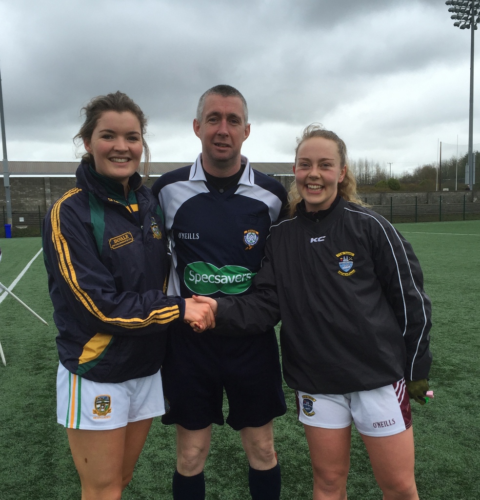 Meath Captain Kate Byrne with Westmeath Captain Jenny Rodgers and referee Niall McCormack at today's Lidl NFL fixture