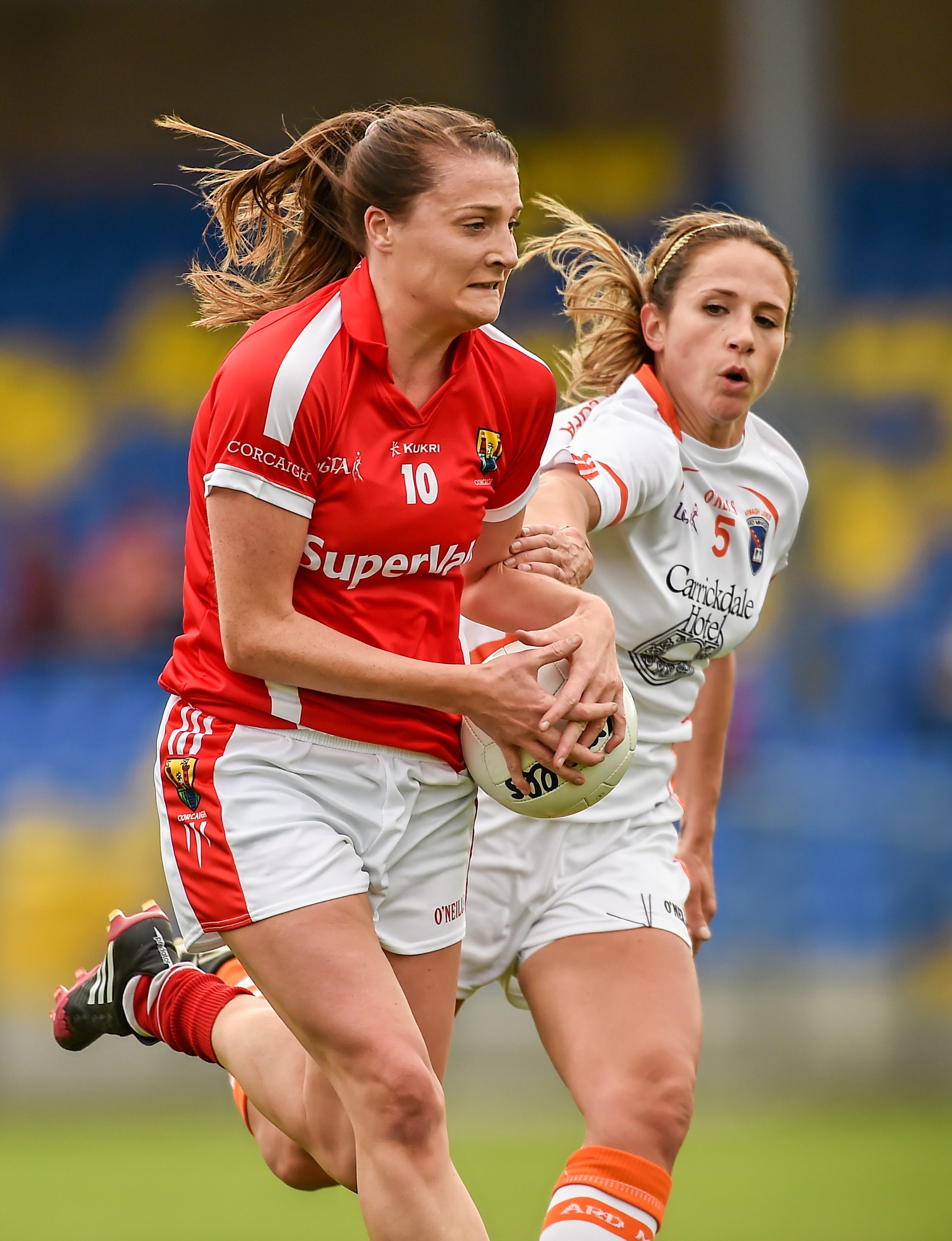 6 September 2014; Annie Walsh, Cork, in action against Sharon Reel, Armagh. TG4 All-Ireland Ladies Football Senior Championship Semi-Final, Armagh v Cork. Pearse Park, Longford. Picture credit: Paul Mohan / SPORTSFILE *** NO REPRODUCTION FEE ***
