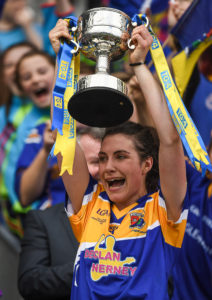 25 September 2016; Longford captain Mairéad Reynolds lifts the cup after the TG4 Ladies Football All-Ireland Junior Football Championship Final match between Antrim and Longford at Croke Park in Dublin.  Photo by Brendan Moran/Sportsfile *** NO REPRODUCTION FEE ***